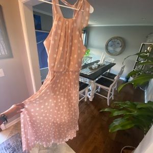 Fun and flowy polka dot!  Dress is very flattering.